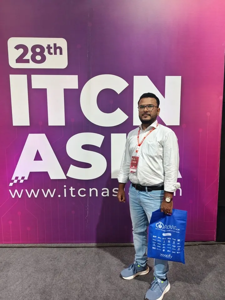 Abdul Rauf Qureshi at the 28th ITCN Asia backdrop